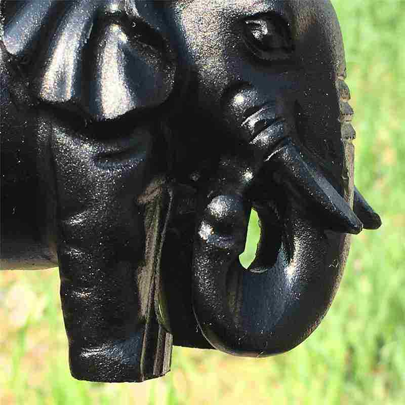 0.35kg Natural obsidian elephant carved Quartz Crystal skull Healing
