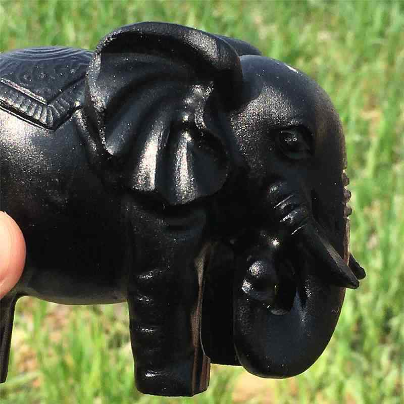 0.35kg Natural obsidian elephant carved Quartz Crystal skull Healing
