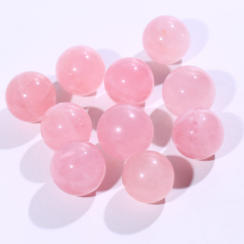 Bola de cristal con forma de piedra rosa 1kg