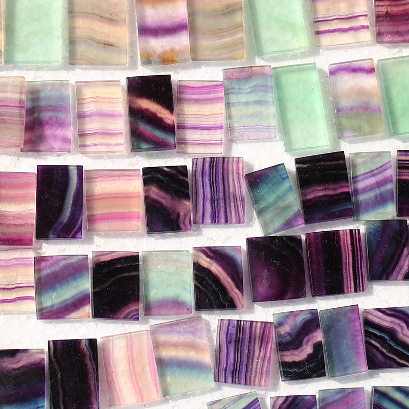 Rainbow fluorite crystal slice is pendant
