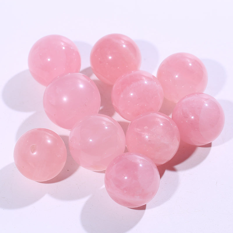 Bola de cristal con forma de piedra rosa 1kg