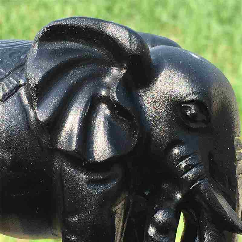 0.35kg Natural obsidian elephant carved Quartz Crystal skull Healing