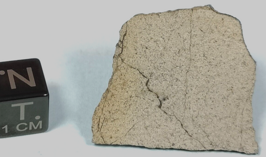 2.78 GR. SLICE NWA 13446 ACHONDRITE METEORITE, PARTIAL CRUST, OLIVINE RICH