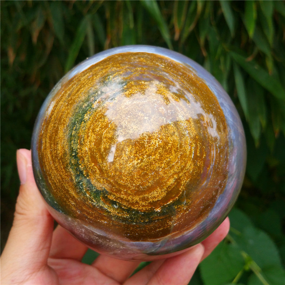 Crystal carved ball of Ocean Jasper