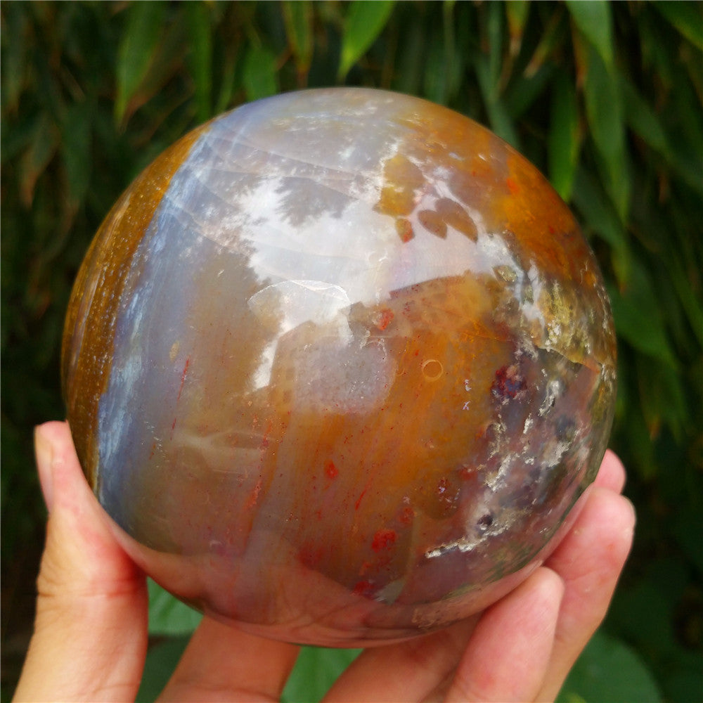 Crystal carved ball of Ocean Jasper