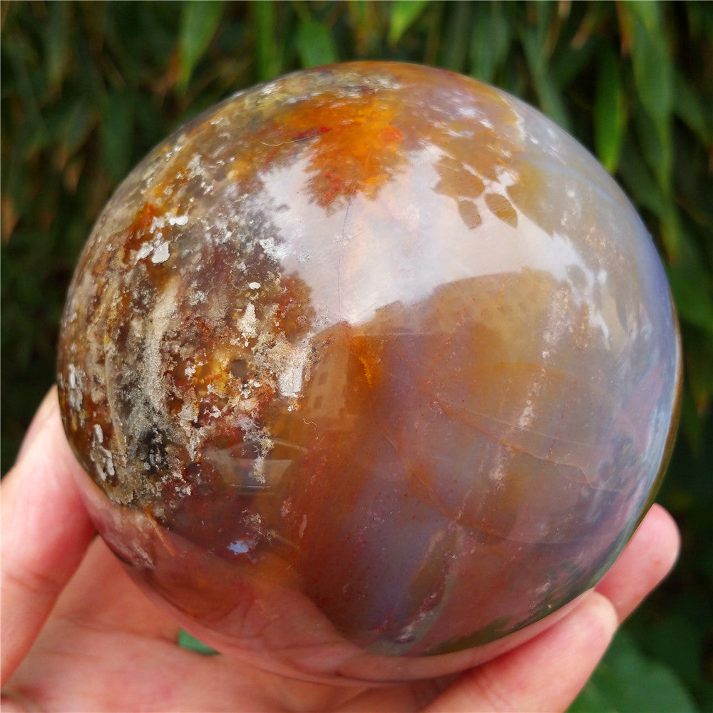 Crystal carved ball of Ocean Jasper