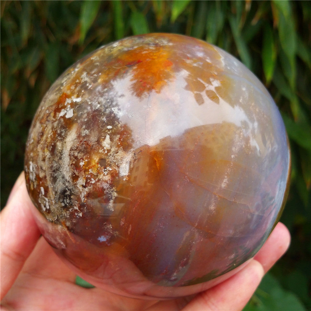 Crystal carved ball of Ocean Jasper