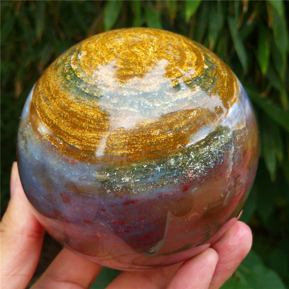 Crystal carved ball of Ocean Jasper