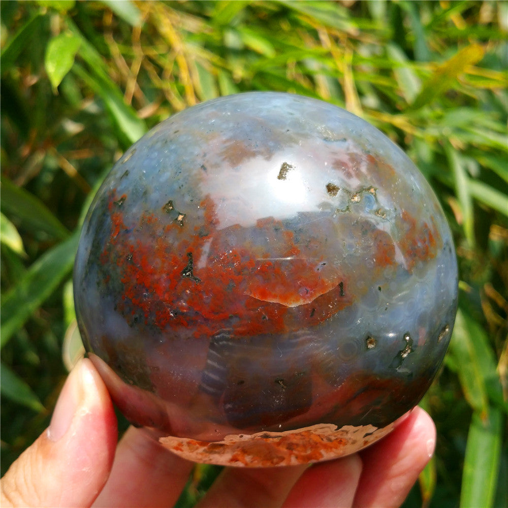 Bola de cristal tallada de Ocean Jasper
