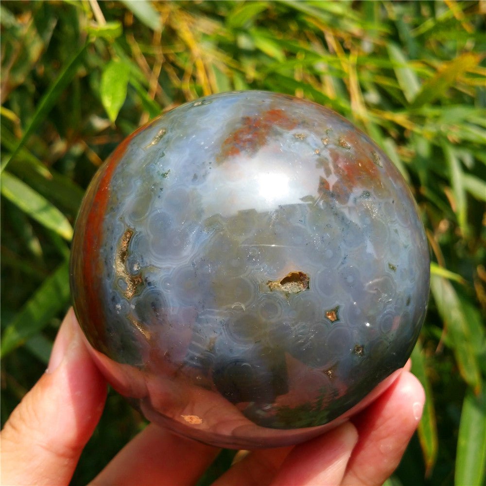 Bola de cristal tallada de Ocean Jasper