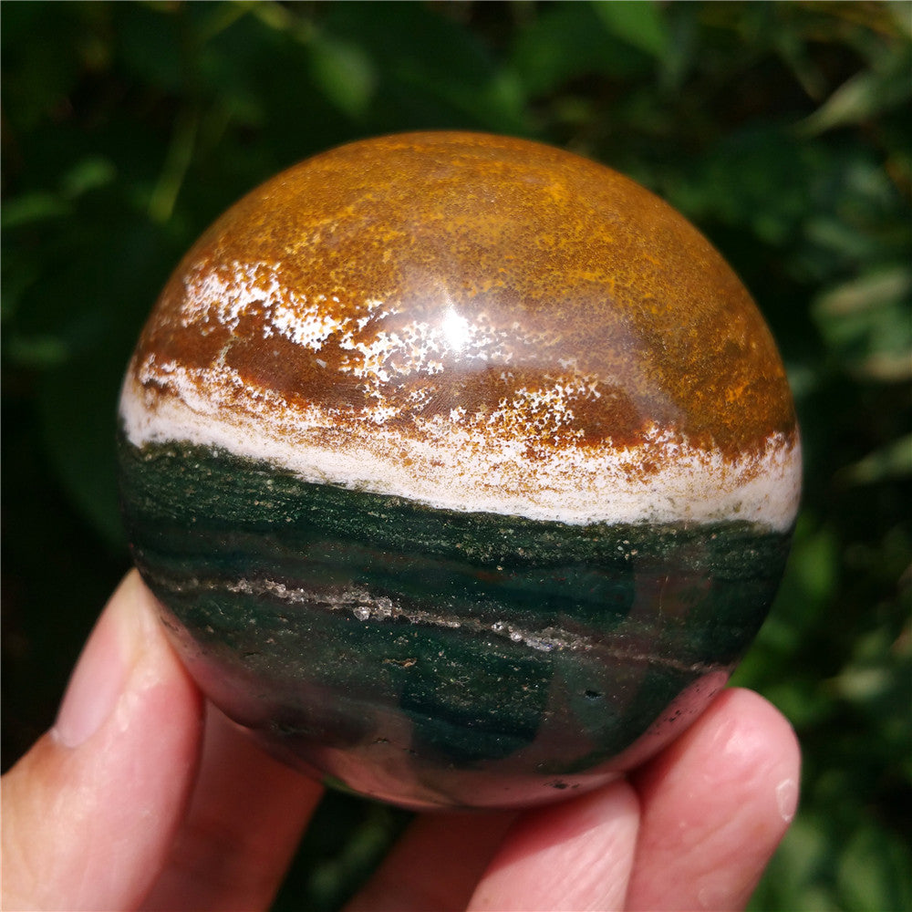 Bola de cristal tallada de Ocean Jasper