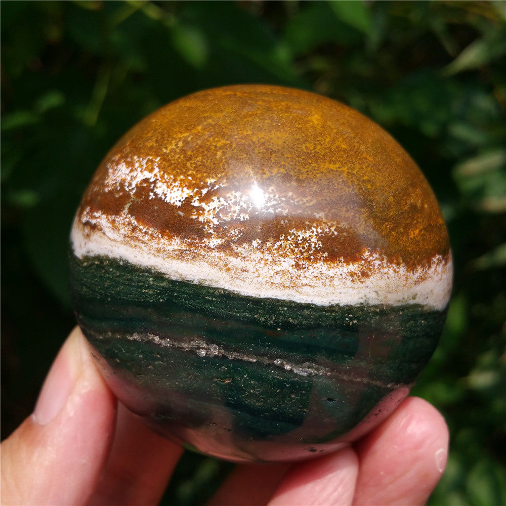 Bola de cristal tallada de Ocean Jasper