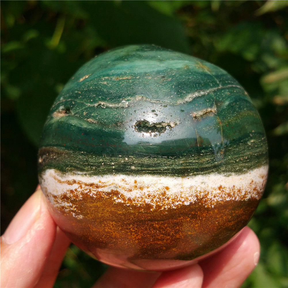 Bola de cristal tallada de Ocean Jasper