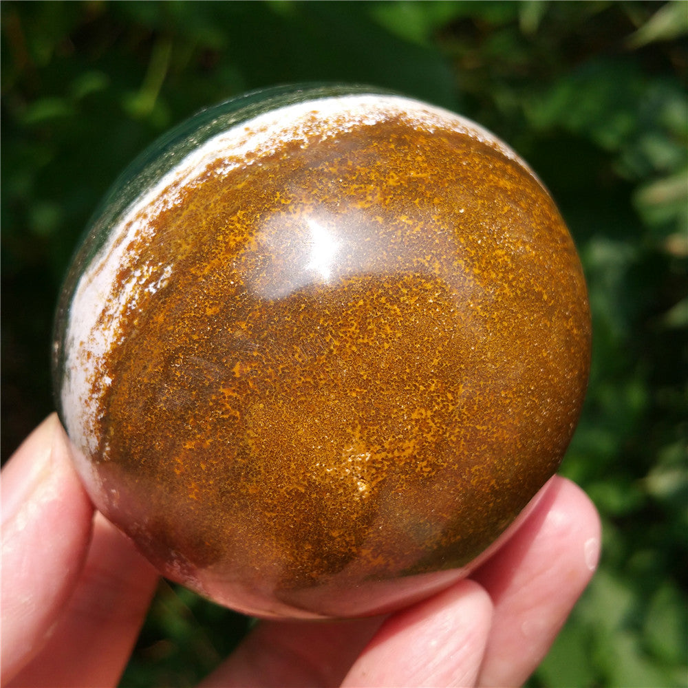 Bola de cristal tallada de Ocean Jasper