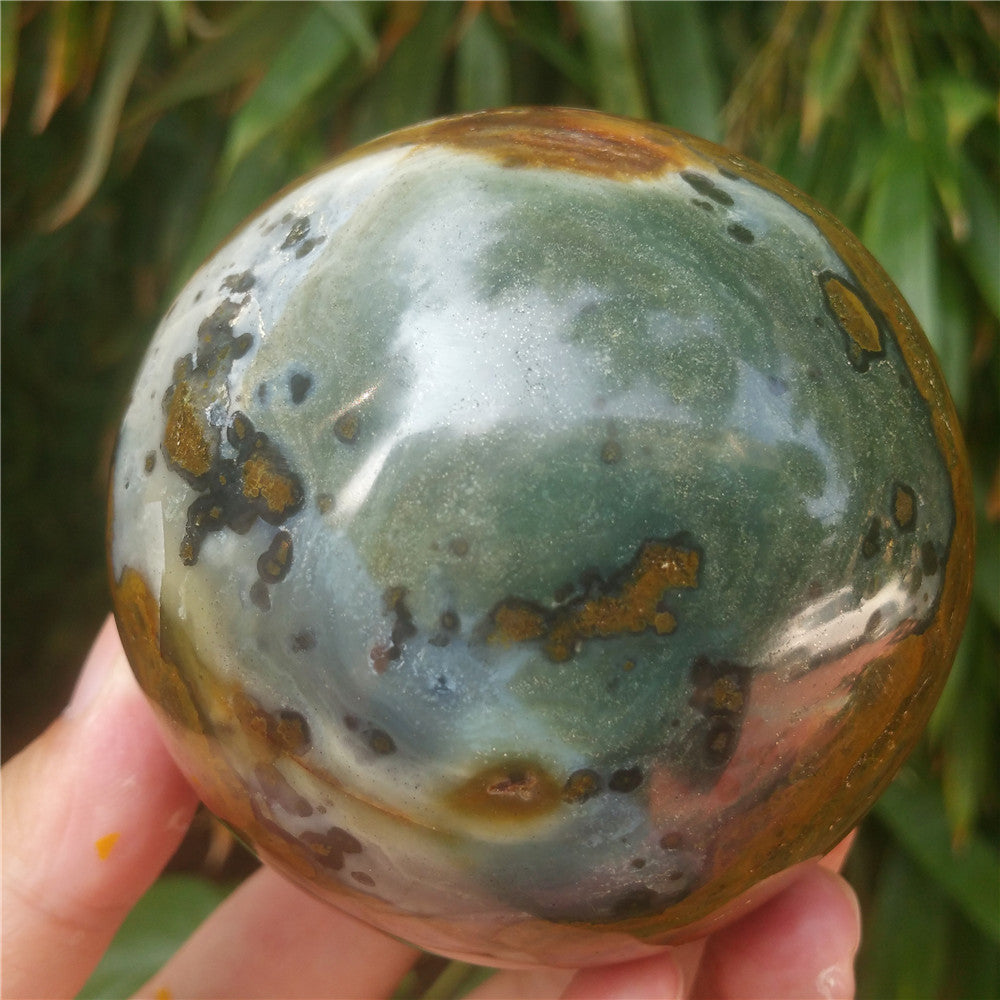 Bola de cristal tallada de Ocean Jasper