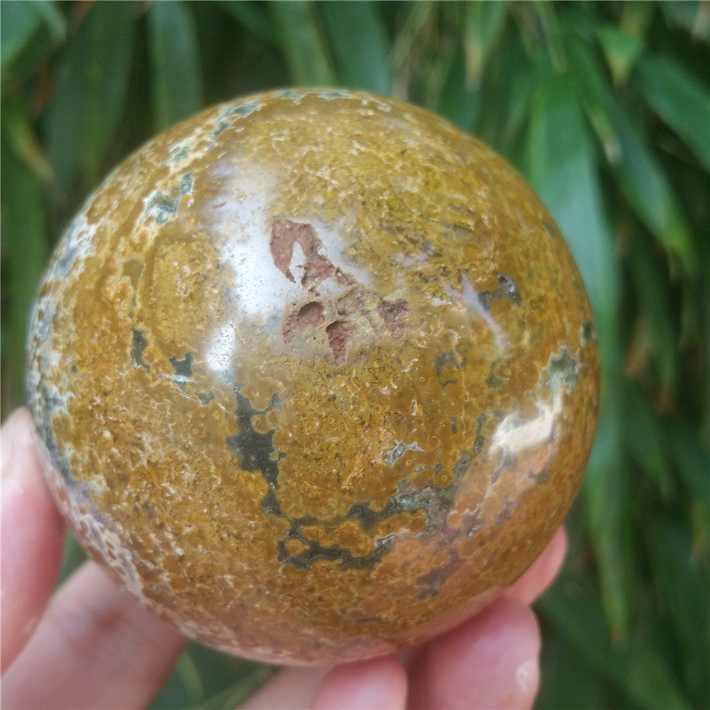 Bola de cristal tallada de Ocean Jasper