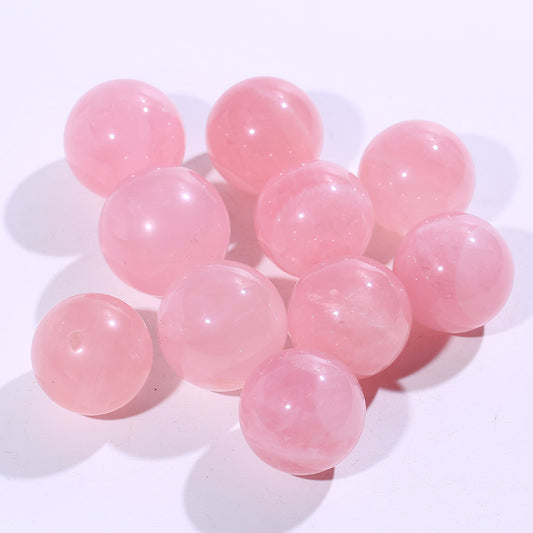 Glóbulos de cuarzo rosa natural de calidad. 
