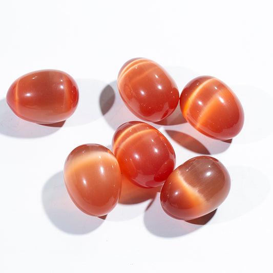 Wholesale orange cat eye stone crystal egg for massage