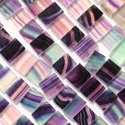 Rainbow fluorite crystal slice is pendant