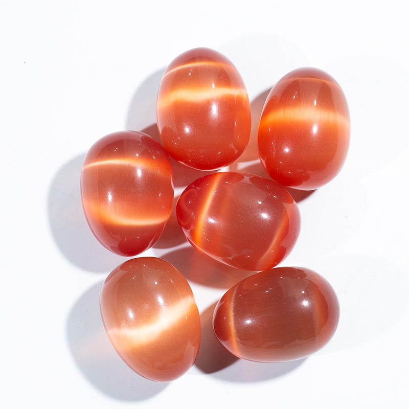 Wholesale orange cat eye stone crystal egg for massage