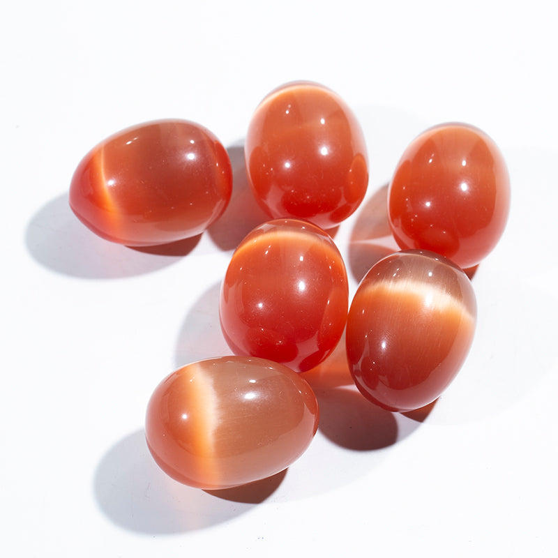 Wholesale orange cat eye stone crystal egg for massage